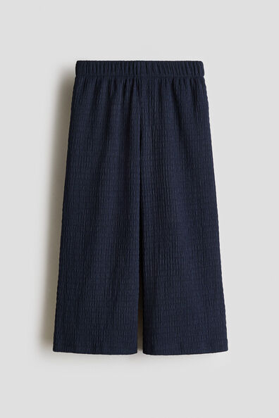 Wide crinkled trousers