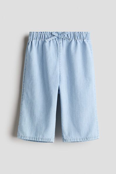 Wide-leg denim trousers