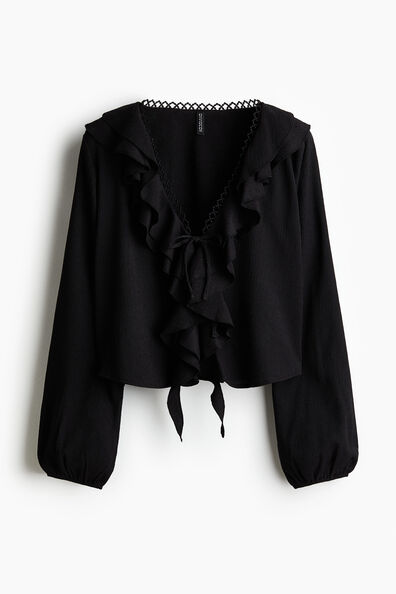 Flounce-trimmed blouse