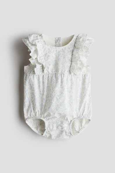 Frilled romper suit