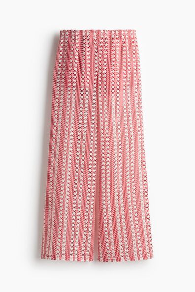 Hole-patterned trousers
