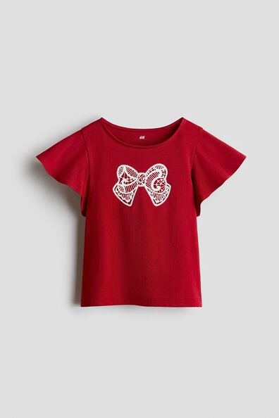 Printed flutter-sleeved top