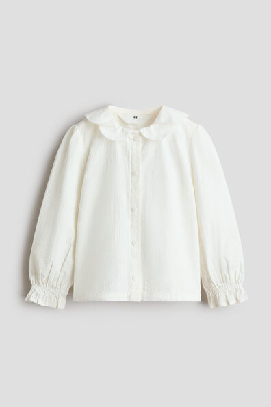 Puff-sleeved seersucker blouse