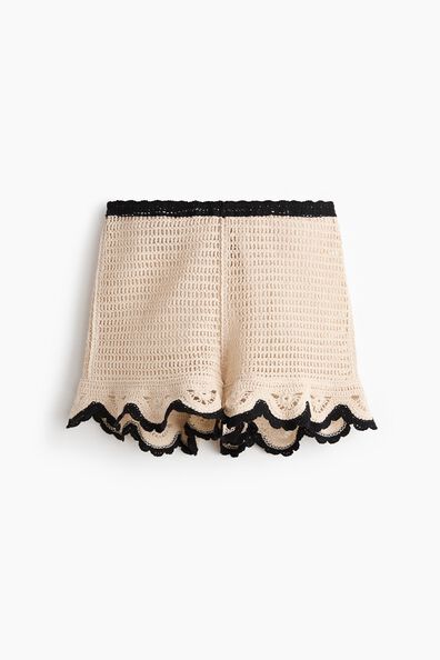 Flounced crochet-look shorts
