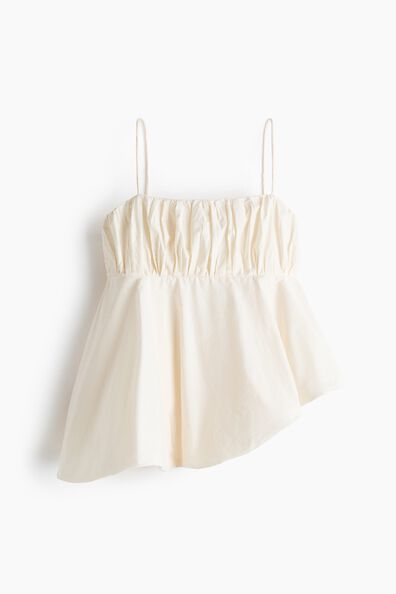 Asymmetric bubble-hem strappy top