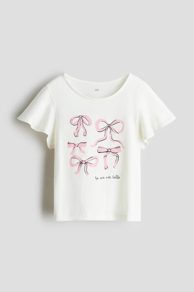 Printed flutter-sleeved top