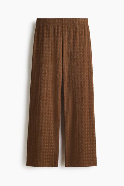 Ankle-length textured jersey trousers
