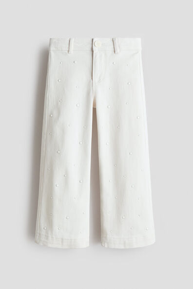 Bead-embellished flared trousers