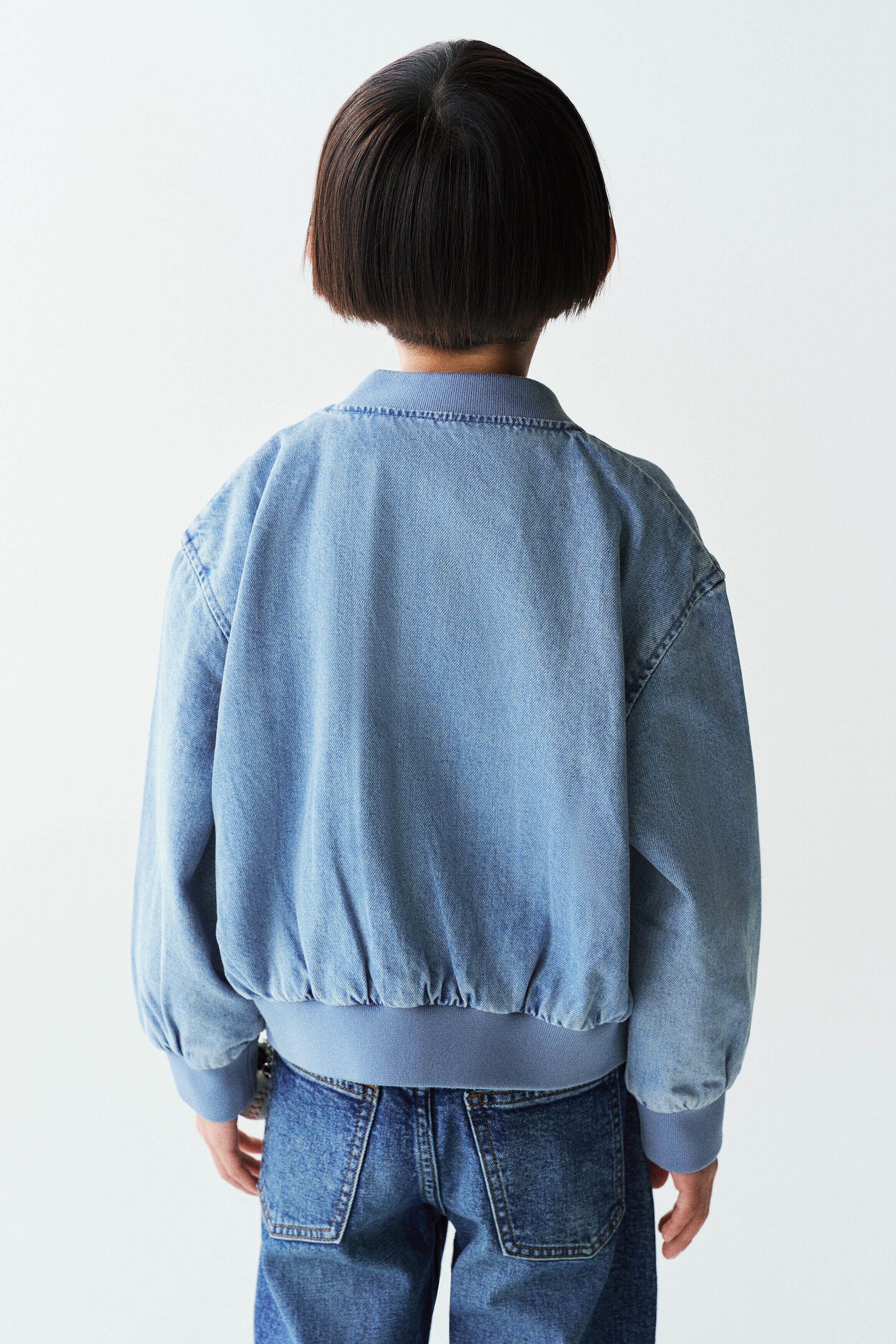 Appliquéd denim bomber jacket