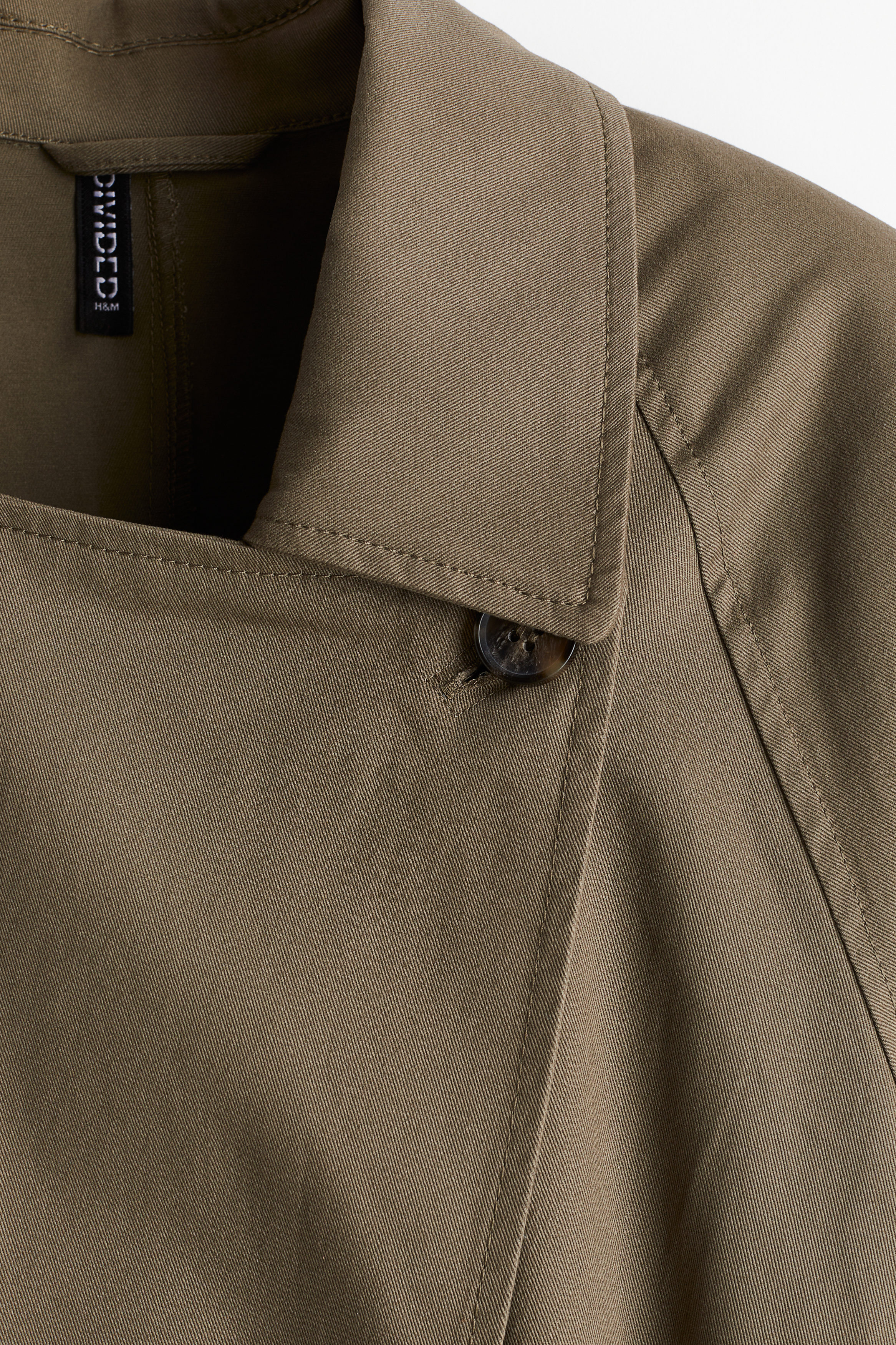 Shoulder-pad trench coat