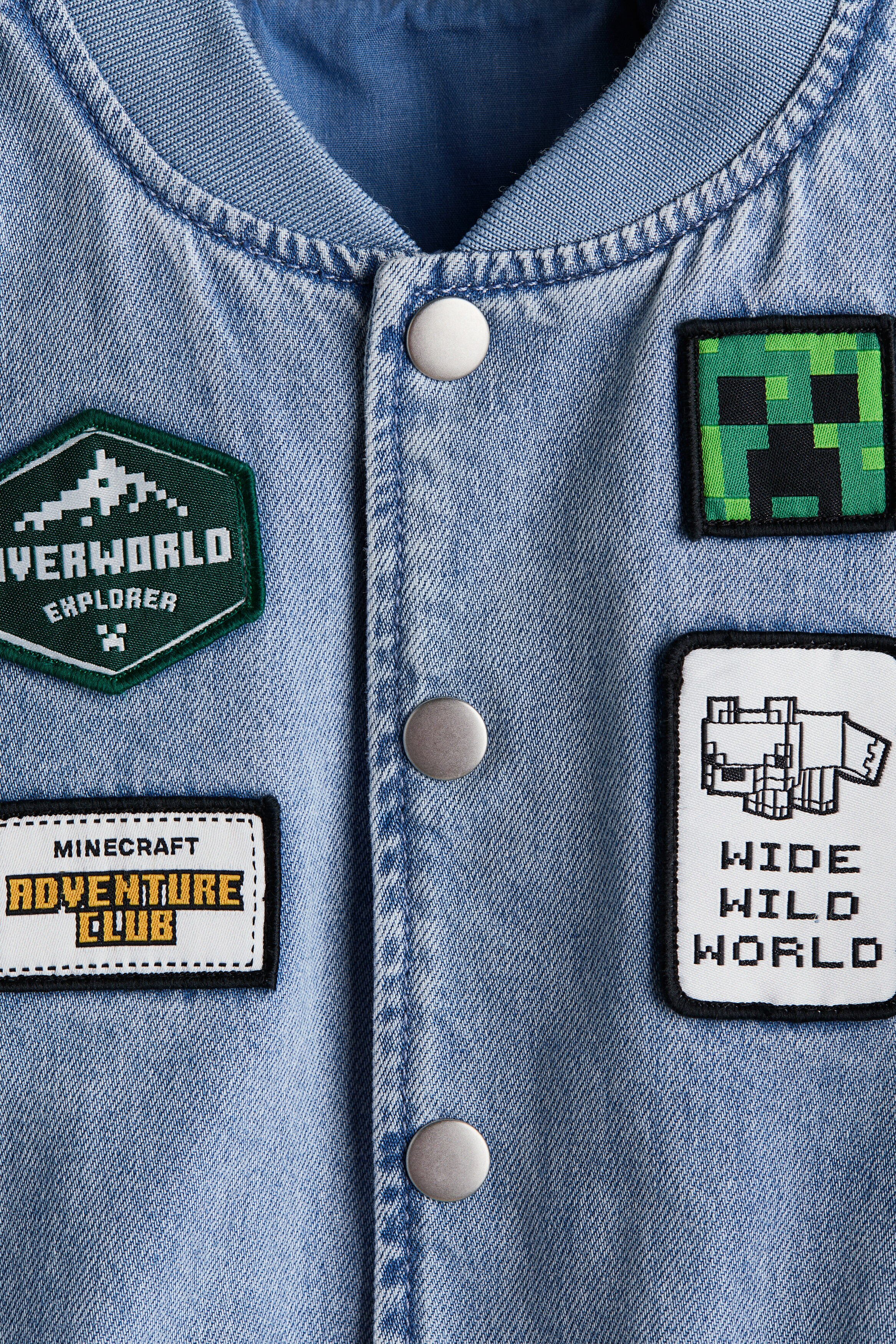 Appliquéd denim bomber jacket
