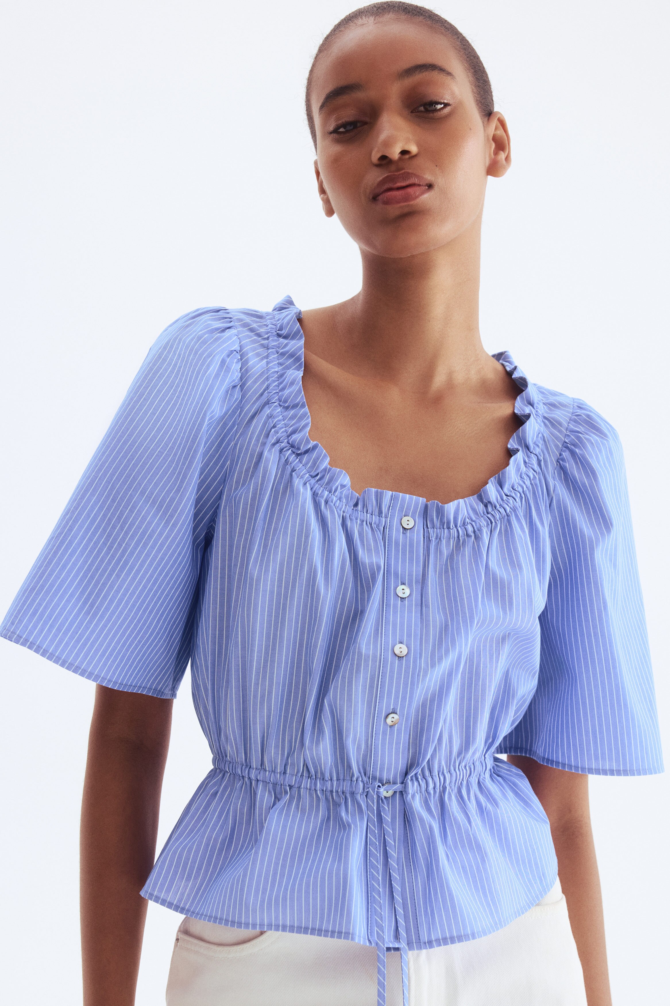 Frill-trimmed cotton blouse