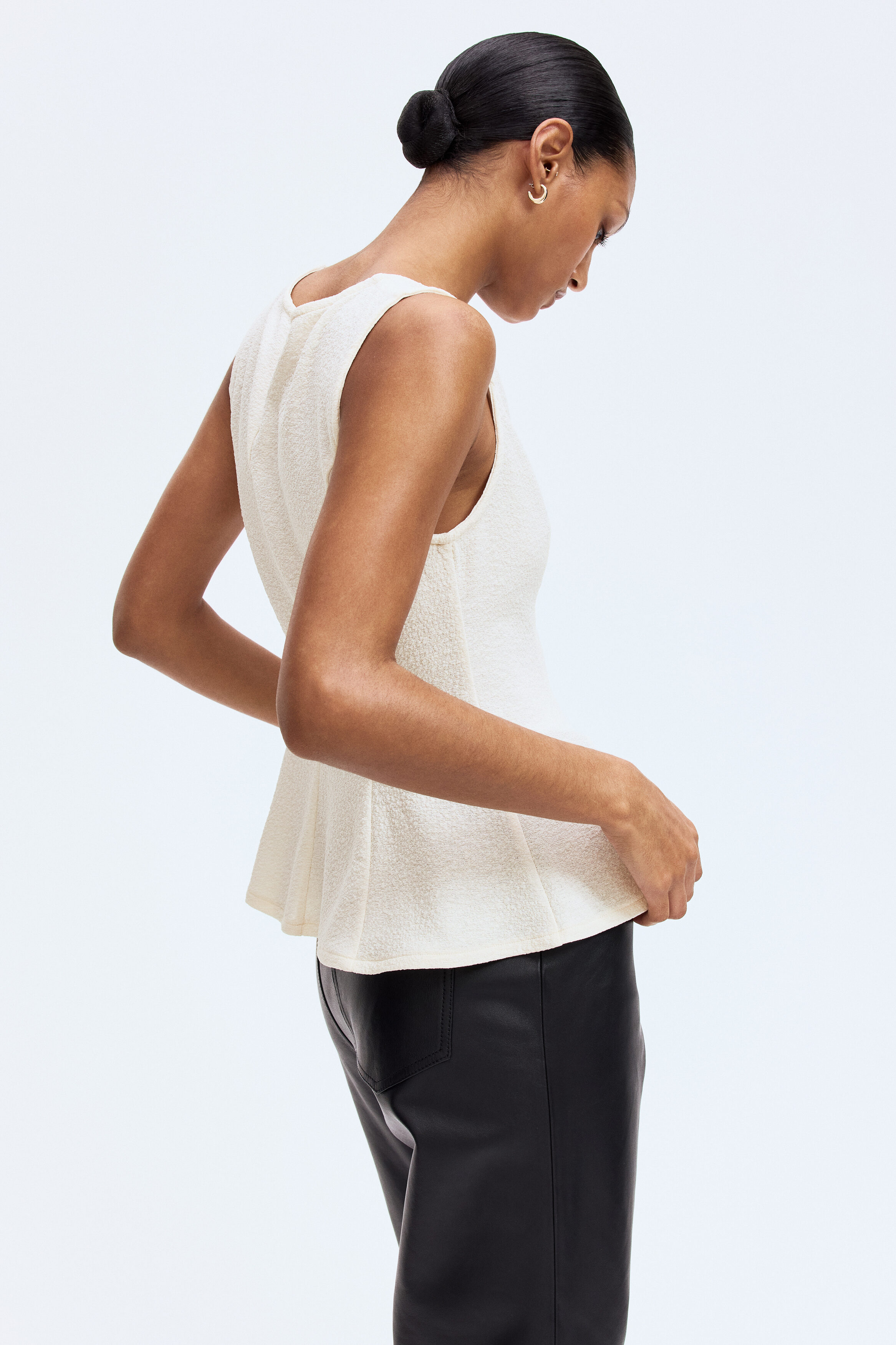 Sleeveless peplum top