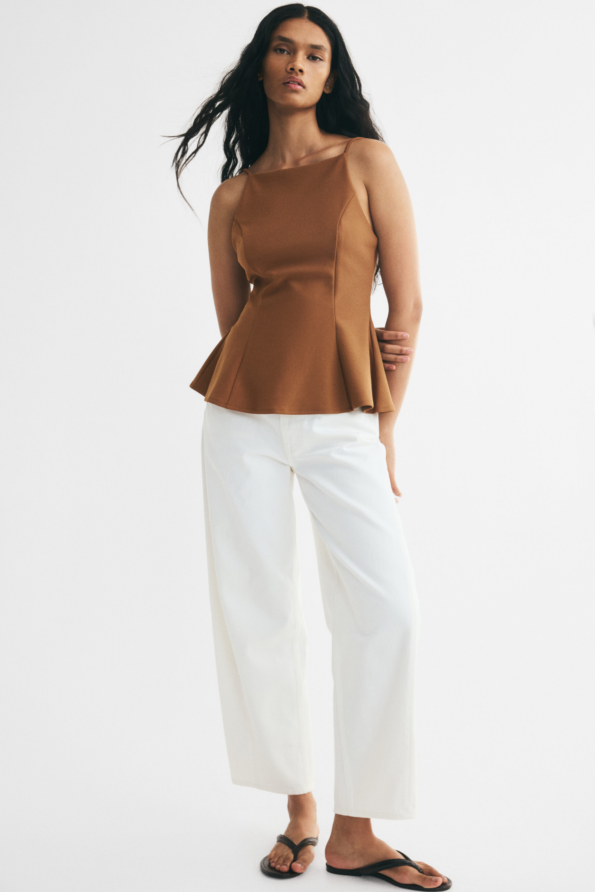 Sleeveless peplum top