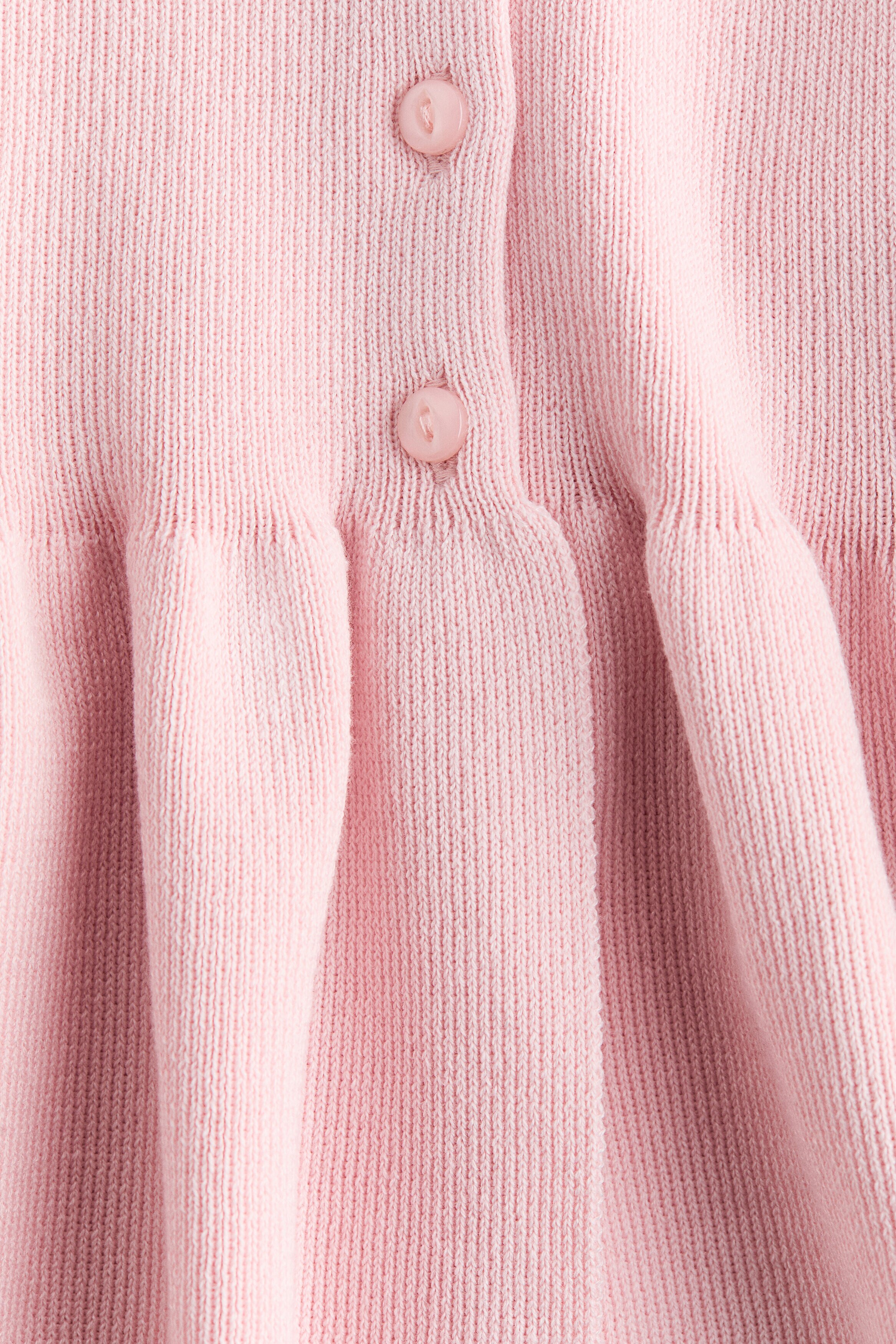 Short-sleeved peplum cardigan