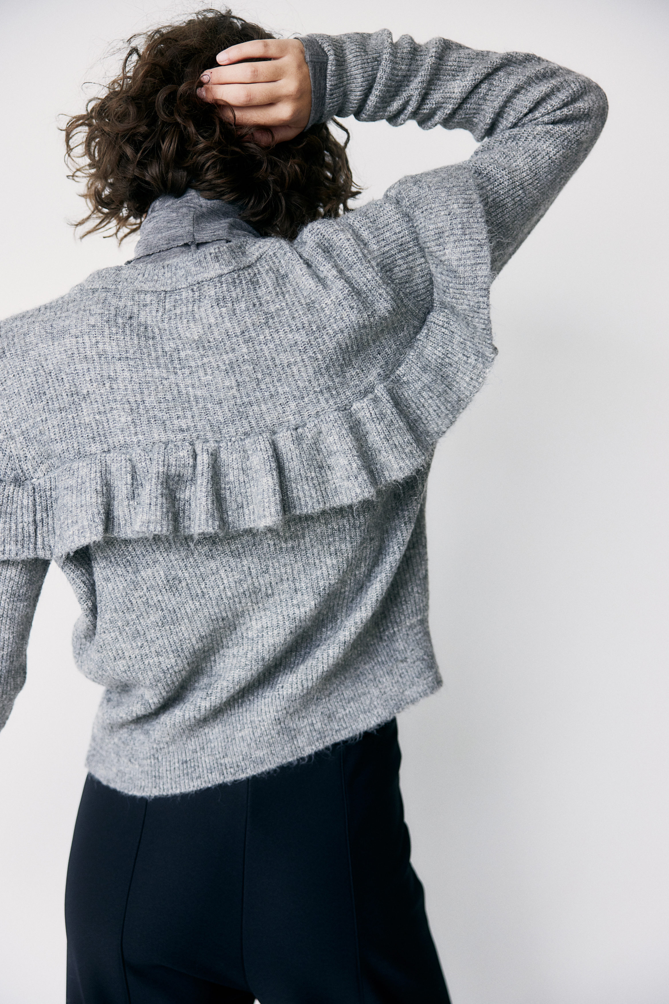 Frill-trimmed rib-knit cardigan