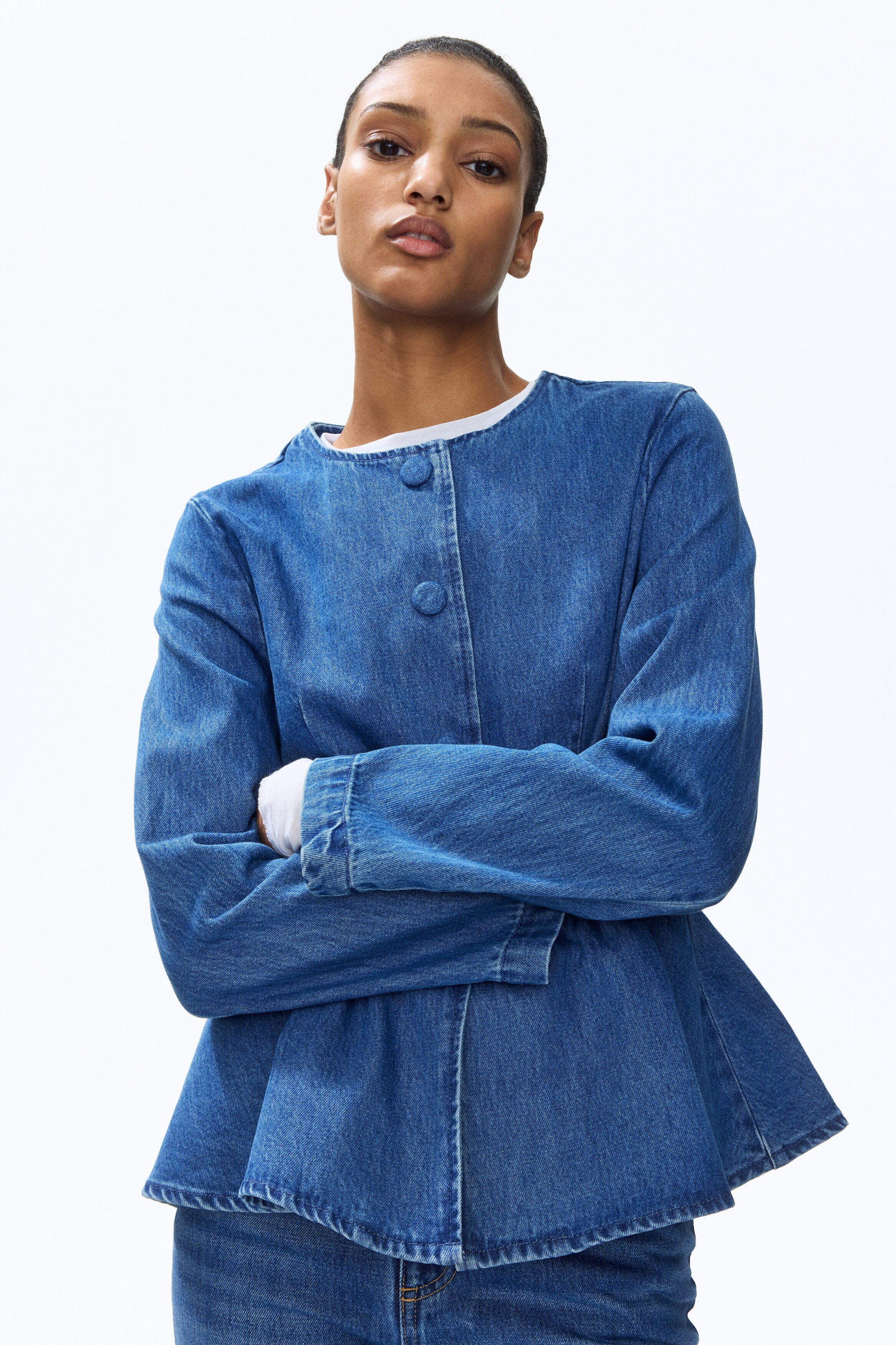 Collarless peplum jacket