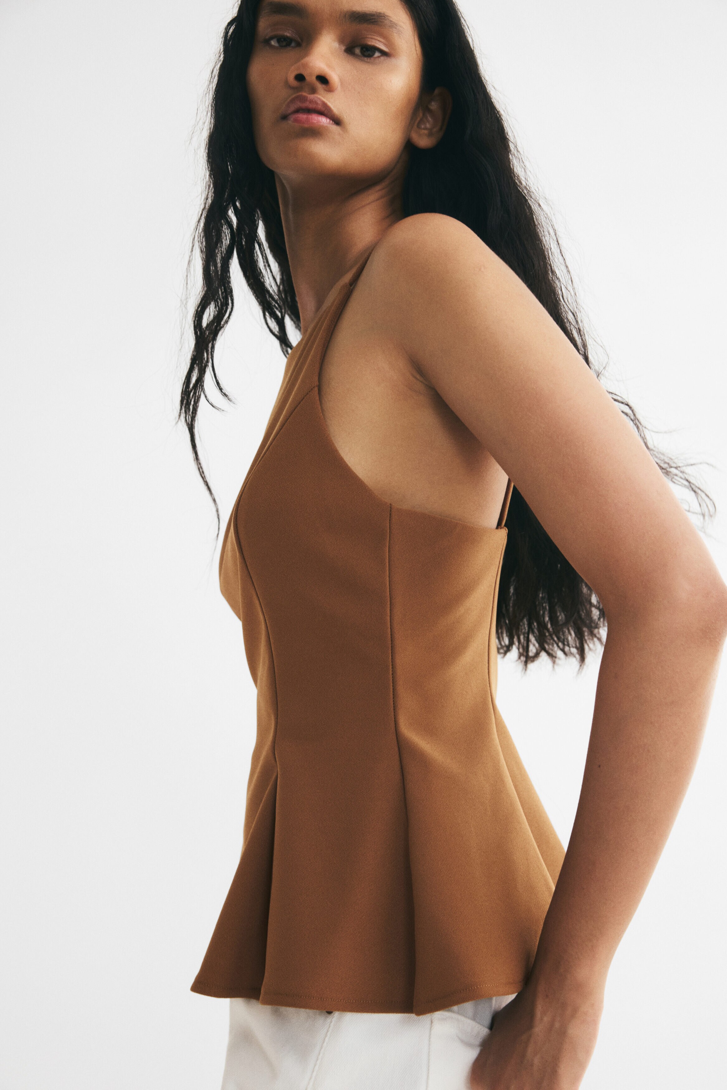 Sleeveless peplum top