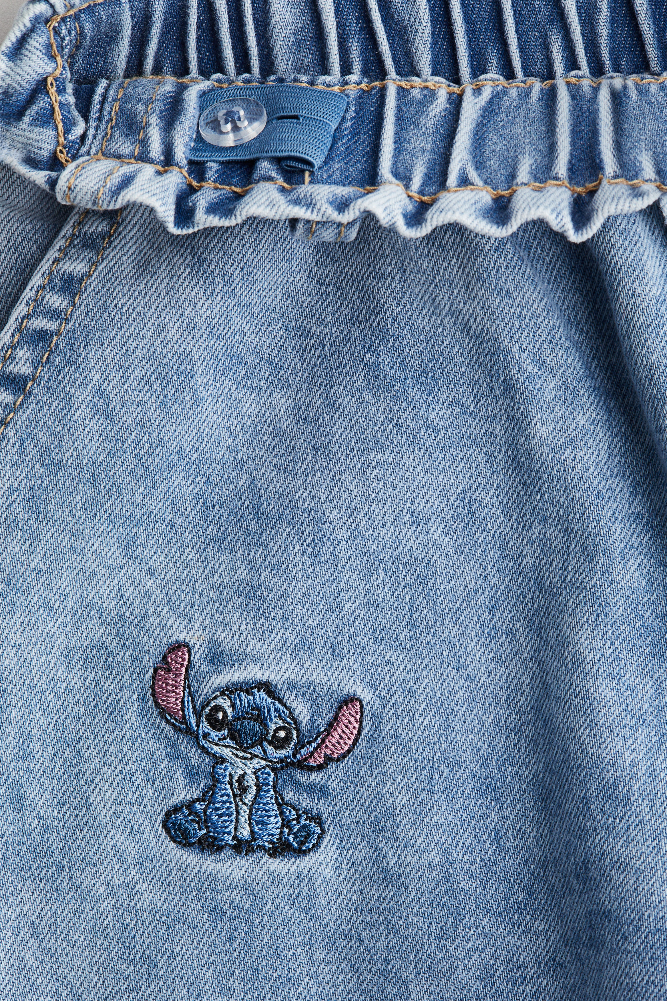 Motif-detail wide leg jeans