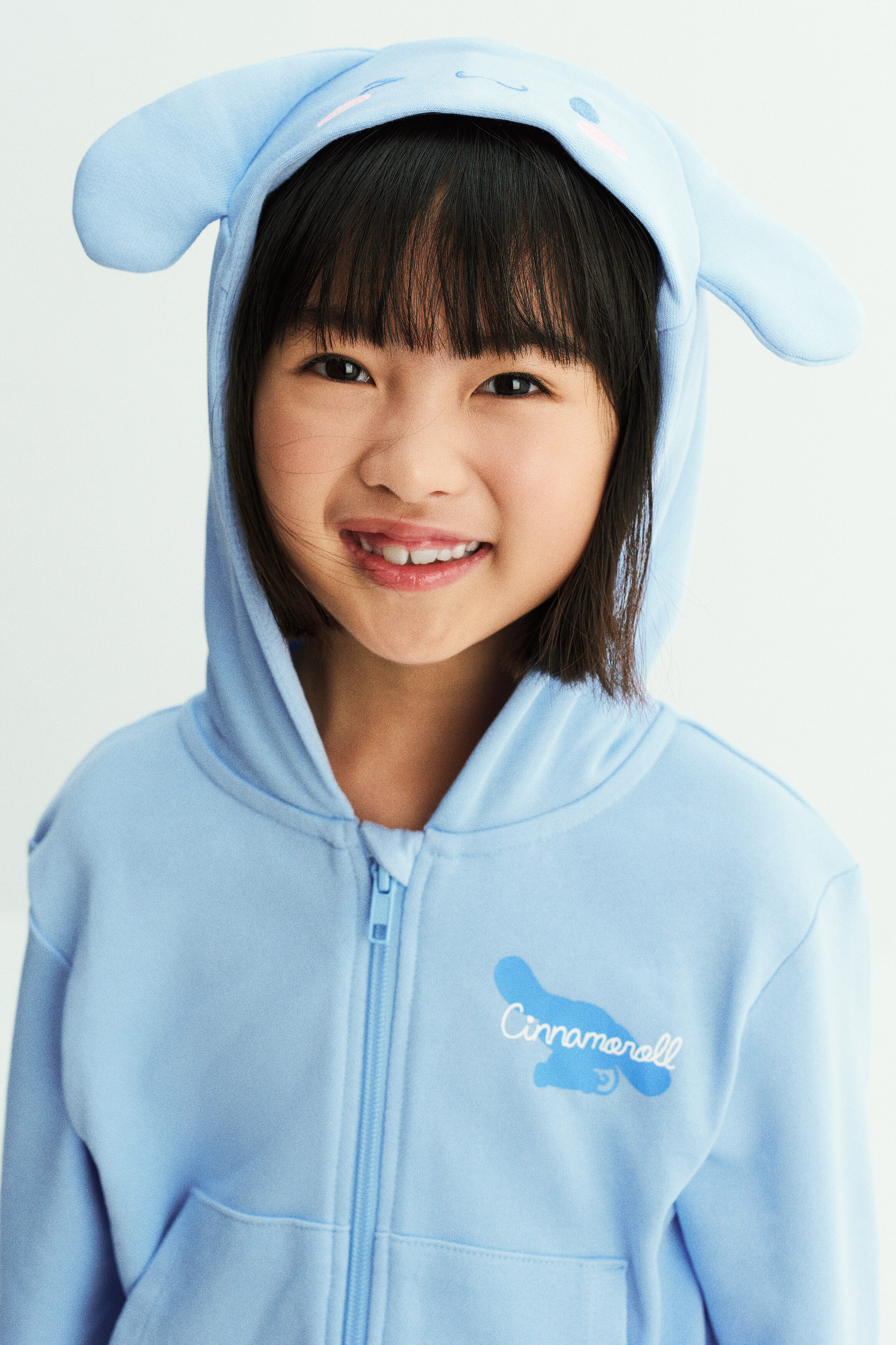 Appliquéd zip-through hoodie